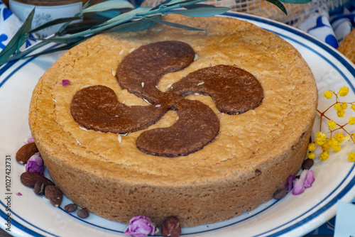 Gateaux tart from Basque Country, brown caramel cheese cake, with different filling, cream, cherry, apricot, walnuts of Perigord, chocolate