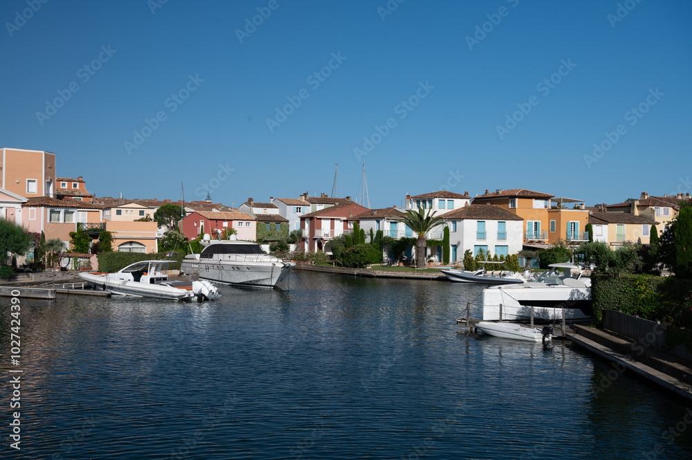 Travel and summer vacation destination, view on houses, roofs, canals and boats in Port Grimaud, Var, Provence, French Riviera, France Travel and summer vacation destination, view on houses, roofs, canals and boats in Port Grimaud, Var, Provence, French Riviera, France