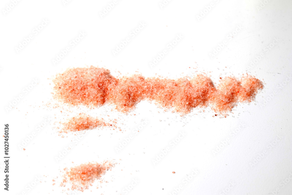 Pile of Pink Himalayan Salt on White Pile of Pink Himalayan Salt on White