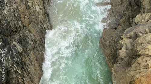 Waves crashing into rocks