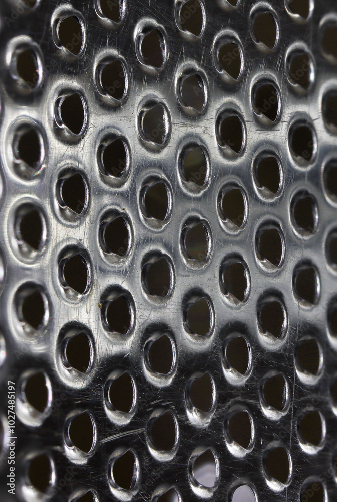 Abstract of inside of cheese grater Abstract of inside of cheese grater
