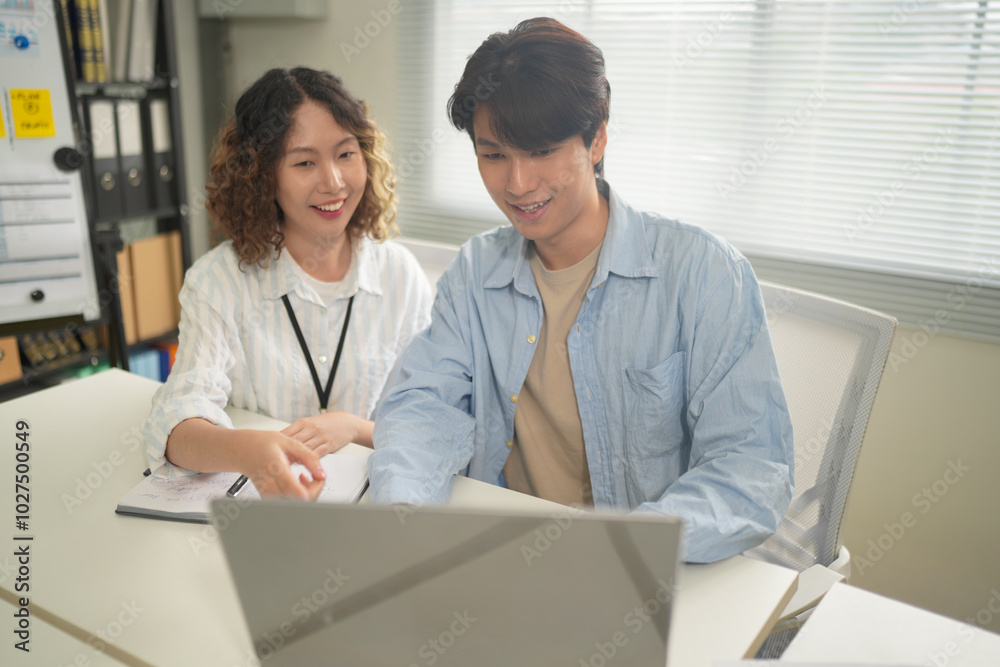 Young business people in office, Group of business people and software developers working as a team in office. Young business people in office, Group of business people and software developers working as a team in office.