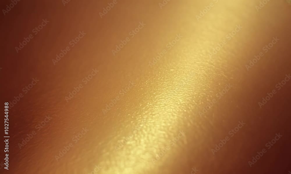 Golden Abstract Background: A warm, inviting, and textured backdrop with a subtle diagonal line of light. This abstract image evokes a sense of luxury, warmth, and sophistication. Golden Abstract Background: A warm, inviting, and textured backdrop with a subtle diagonal line of light. This abstract image evokes a sense of luxury, warmth, and sophistication.