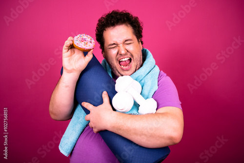 Diet and healthy lifestyle. Funny fat man and sweet donuts. photo