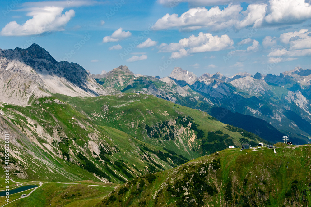 Fototapeta premium Fantastic alpine scenery at the Arlberg pass in Austria seen from a small plane