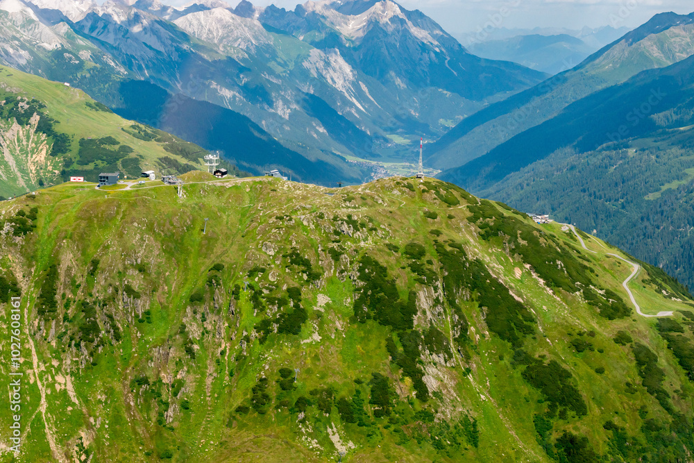Fototapeta premium Fantastic alpine scenery at the Arlberg pass in Austria seen from a small plane