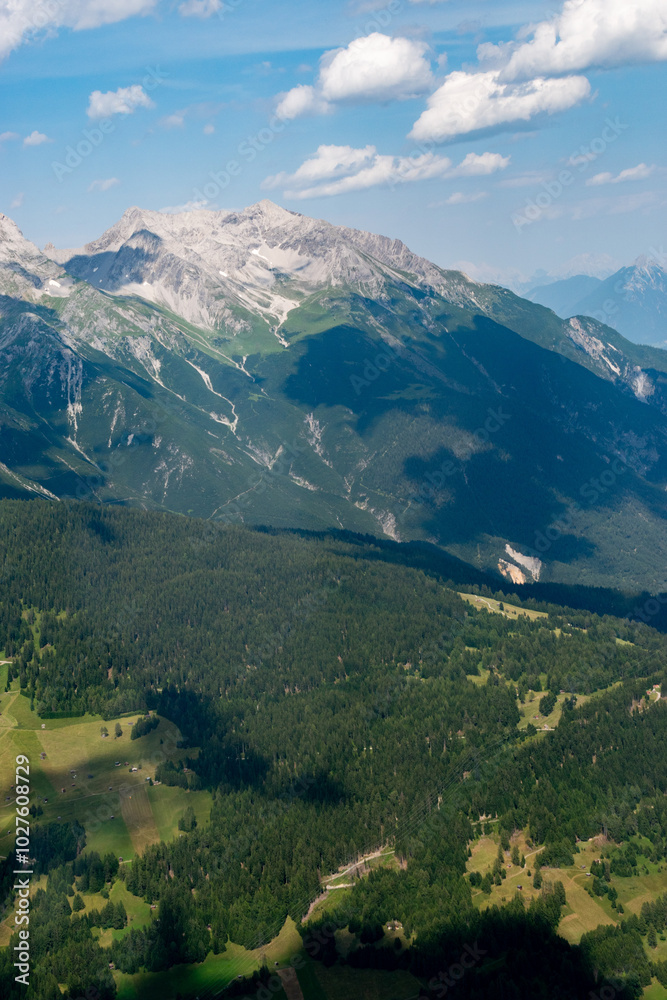 Fantastic alpine scenery at the Arlberg pass in Austria seen from a small plane