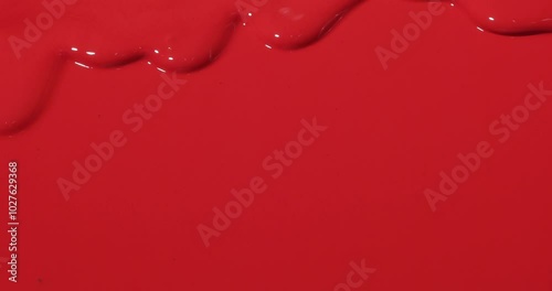 flowing red paint cascades across red background, creating a brilliant wave of texture full with emotions