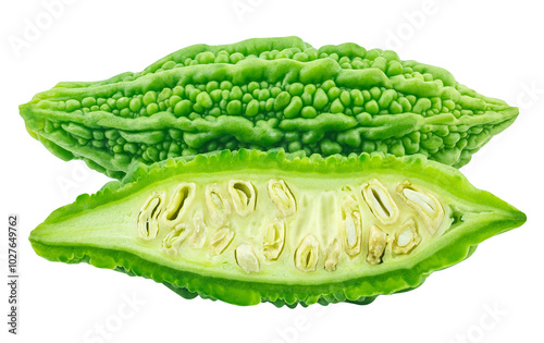 slices of bitter gourd arranged on white background