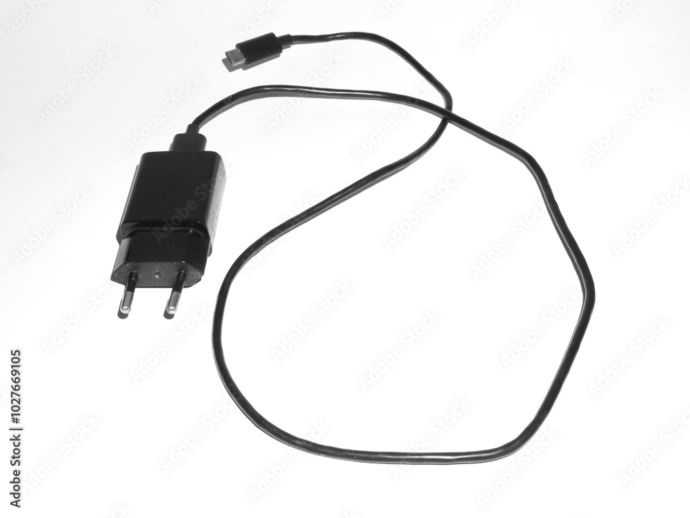 USB phone charger with cable and adapter. Portable mobile power supply with wire, connector and plug. Charging item for smartphone. Flat illustration isolated on white background. USB phone charger with cable and adapter. Portable mobile power supply with wire, connector and plug. Charging item for smartphone. Flat illustration isolated on white background.