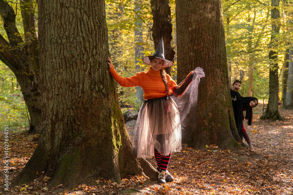 halloween in autumn forest, orange sweater, witch in striped stockings, teenager, boy dracula, red, funny witch, halloween, day of the dead holiday, dressed up witch halloween in autumn forest, orange sweater, witch in striped stockings, teenager, boy dracula, red, funny witch, halloween, day of the dead holiday, dressed up witch