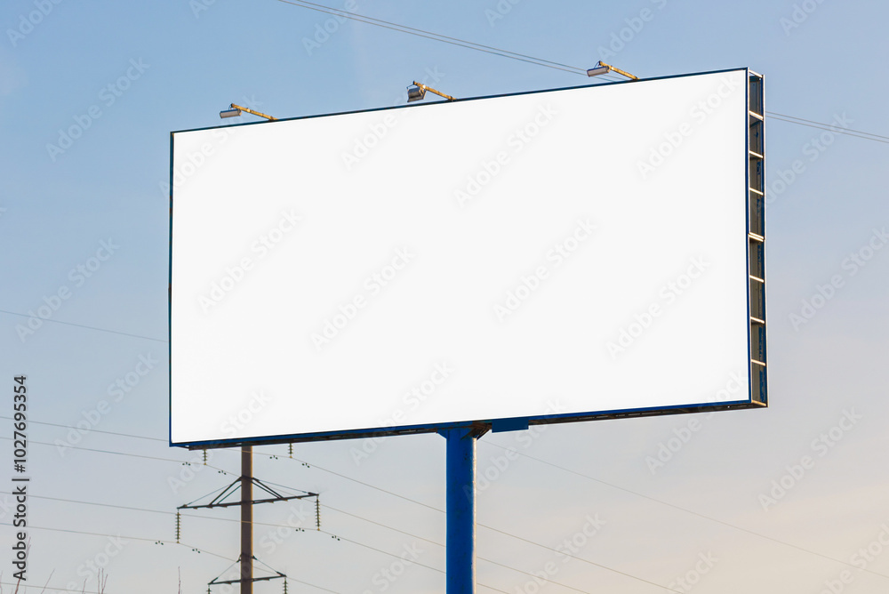 white billboard along the highway on a winter snow day. Background for design and advertising. white billboard along the highway on a winter snow day. Background for design and advertising.