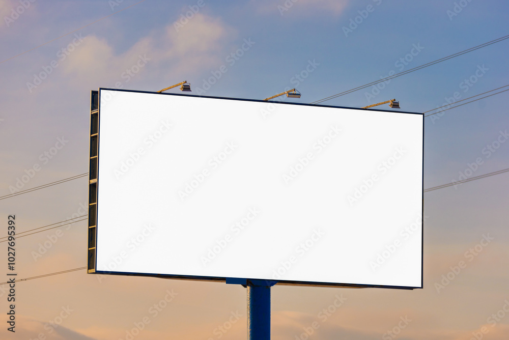 white billboard along the highway on a winter snow day. Background for design and advertising. white billboard along the highway on a winter snow day. Background for design and advertising.