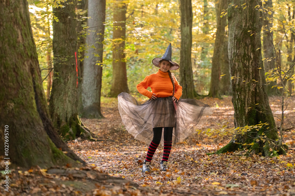 halloween, day of the dead holiday, dressed up witch, funny witch, halloween in autumn forest, orange sweater, witch in striped stockings, teenager halloween, day of the dead holiday, dressed up witch, funny witch, halloween in autumn forest, orange sweater, witch in striped stockings, teenager