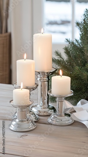 Elegant minimalist candelabra with white candles and flowing tulle ribbons in a serene dark setting