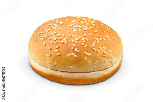 Freshly baked sesame seed hamburger bun isolated. Transparent PNG image.