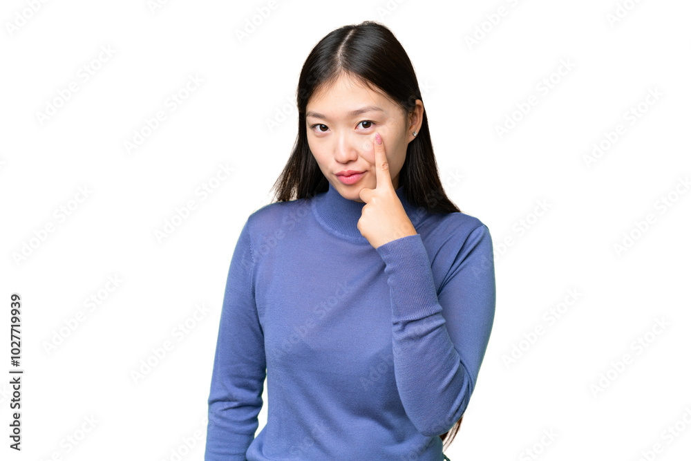 Young Asian woman over isolated chroma key background showing something Young Asian woman over isolated chroma key background showing something