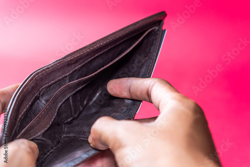 Black Leather Wallet with Credit Cards on Pink Background