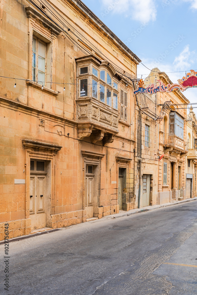 Fototapeta premium Street view in Xaghra, one of the largest towns in Gozo. Malta