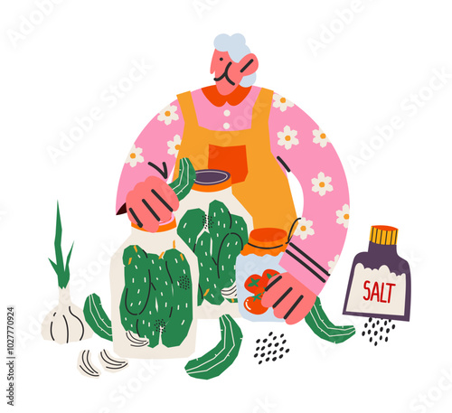 Character grandmother closes pickles for the winter in the kitchen. An elderly kind woman marinates the harvest for the winter in jars. Traditional home recipes, food in jars