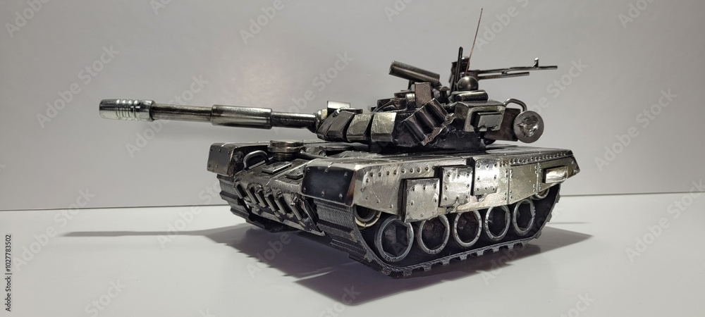 Obraz premium T-90A Russian tank inspiration. Scrap metal art welding sculpture. Armored vehicle scale model make with recycled metal.