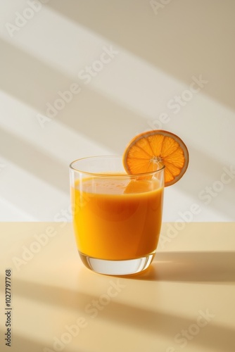 Fresh Orange Juice with Citrus Slice on Light Background. photo