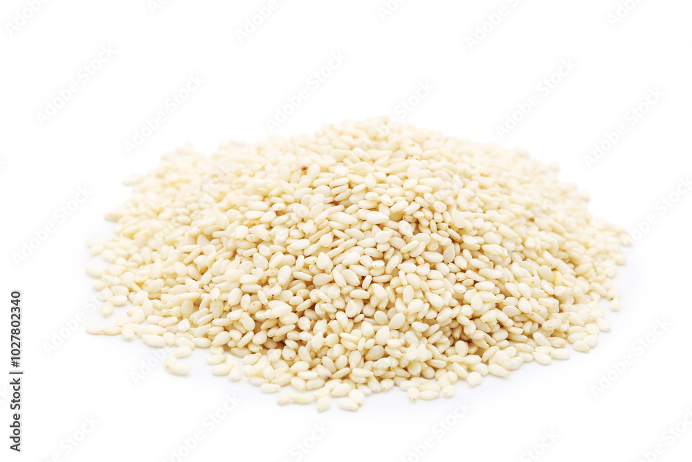 Heap of sesame seeds isolated on white background Heap of sesame seeds isolated on white background