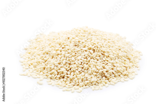 Heap of sesame seeds isolated on white background