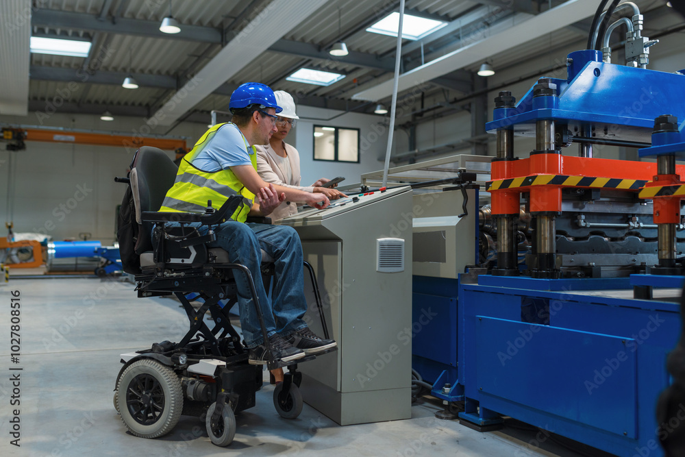 Female manager training a new employee with a disability for a job, explaining work on machines. Industry, inclusion and workplace concept. Female manager training a new employee with a disability for a job, explaining work on machines. Industry, inclusion and workplace concept.