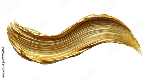 Golden paint stroke on a white background demonstrating texture and artistic ...