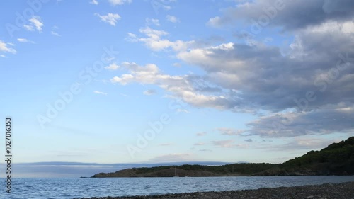 sunset timelapse at garbet beach cove in colera costa brava catalunya spain photo