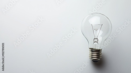 Lightbulb on a clean white background, perfect for text overlay