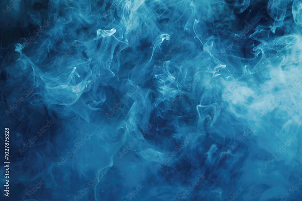 Soft, blue smoke curls and swirls in an abstract, mesmerizing pattern against a dark background, evoking a sense of mystery and calm. Soft, blue smoke curls and swirls in an abstract, mesmerizing pattern against a dark background, evoking a sense of mystery and calm.