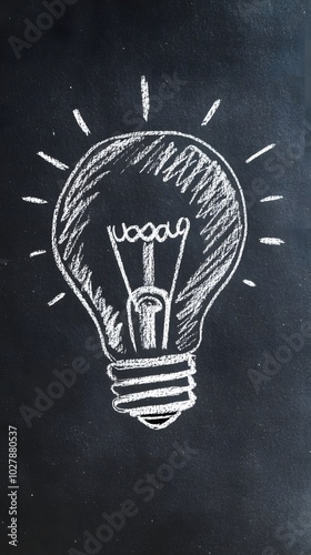 Logo, a light bulb drawn with chalk on a blackboard background