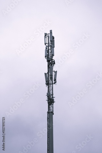 5G tower in gloomy clouds