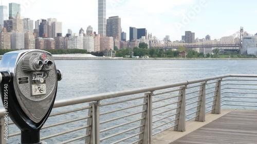 New York City waterfront skyline, Manhattan Midtown buildings, riverfront skyscrapers. Waterside cityscape, tower viewer, Gantry Plaza. Long Island, Queens. United States tourism. Queensboro bridge.