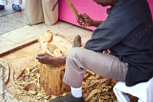 Traditional Wood Carving Artisan at Work