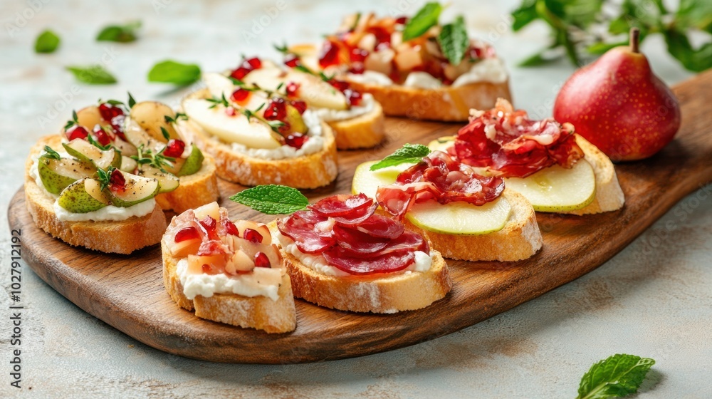 snack and appetizer buffet table provided by the caterer. A selection of canapés featuring cheese, pears, bruschetta, jamon, and mint snack and appetizer buffet table provided by the caterer. A selection of canapés featuring cheese, pears, bruschetta, jamon, and mint