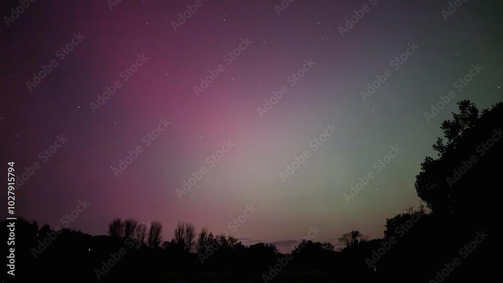 Aurora borealis, northern lights in the sky above Dangan, Galway, Ireland, nature background