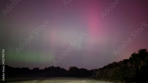 Obraz na płótnie Aurora borealis, northern lights in the sky above Dangan, Galway, Ireland, nature background w salonie