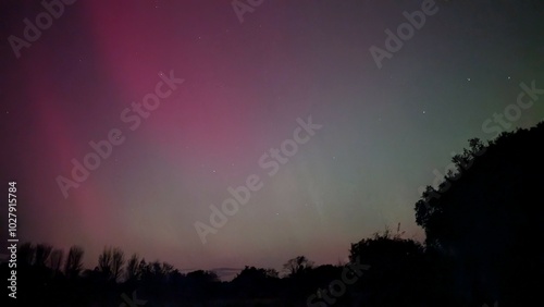 Obraz na płótnie Aurora borealis, northern lights in the sky above Dangan, Galway, Ireland, nature background w salonie