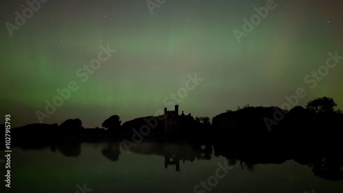 Obraz na płótnie Aurora borealis, northern lights in the sky above Menlo castle, Galway, Ireland, nature background w salonie