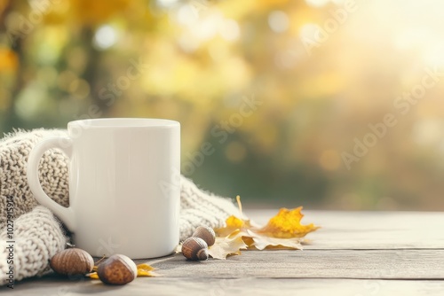 Cozy autumn morning with a warm mug of coffee surrounded by leaves and acorns in a sunlit outdoor setting