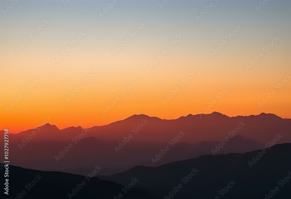 Obraz premium Majestic Sunrise Over Mountain Range