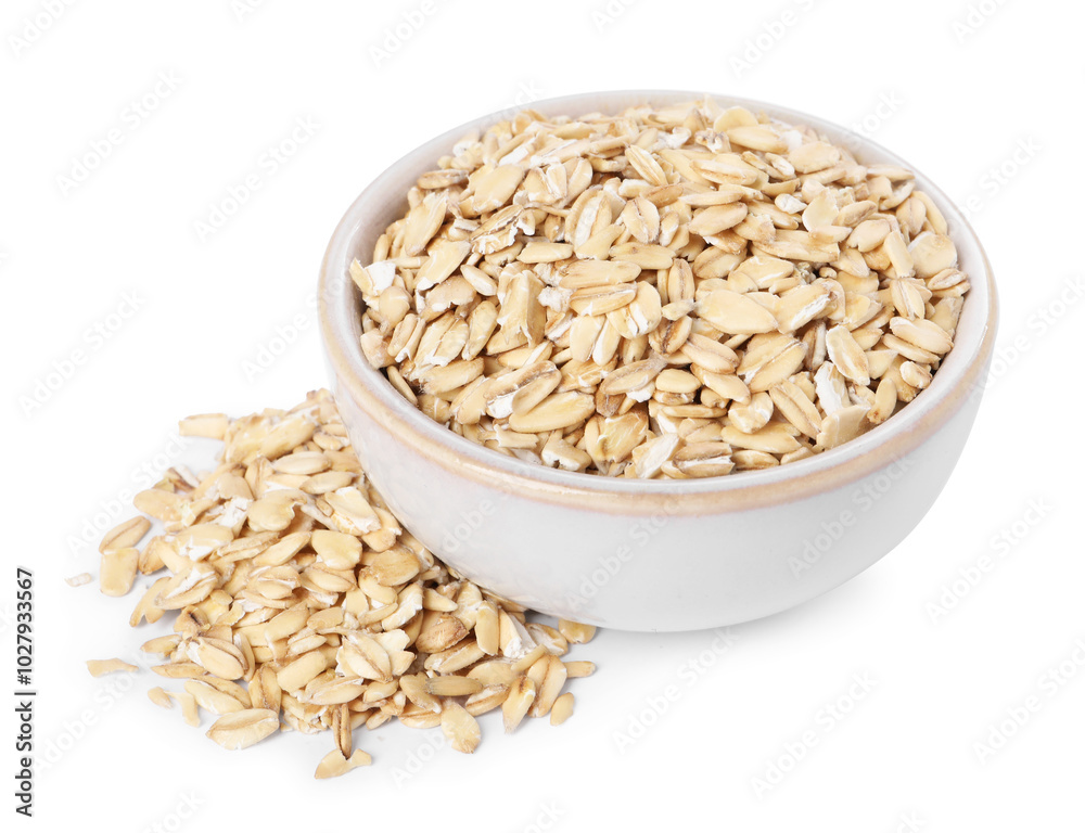 Dry oat flakes in bowl isolated on white Dry oat flakes in bowl isolated on white