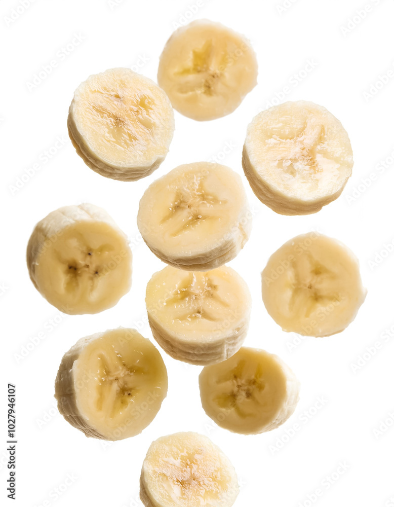 Flying banana slices, isolated on a white background Flying banana slices, isolated on a white background