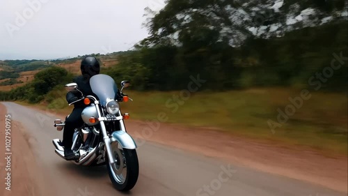 Wallpaper Mural A motorcycle is driving down a road Torontodigital.ca