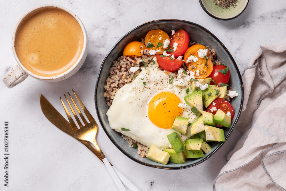quinoa bowl with egg, avocado and tomato