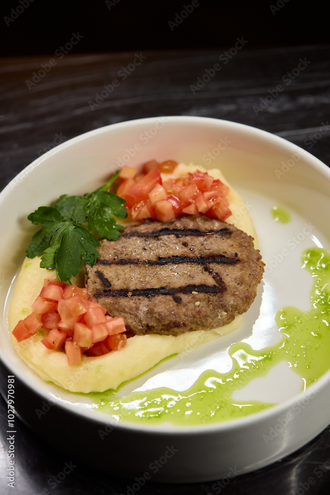 Savor a Grilled Steak served with Tomato Salsa and Green Sauce, beautifully presented Savor a Grilled Steak served with Tomato Salsa and Green Sauce, beautifully presented