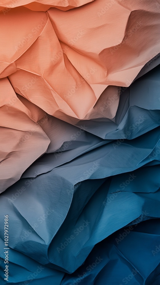 Obraz premium Orange and Blue Gradient Paper Texture: Folded Paper Background